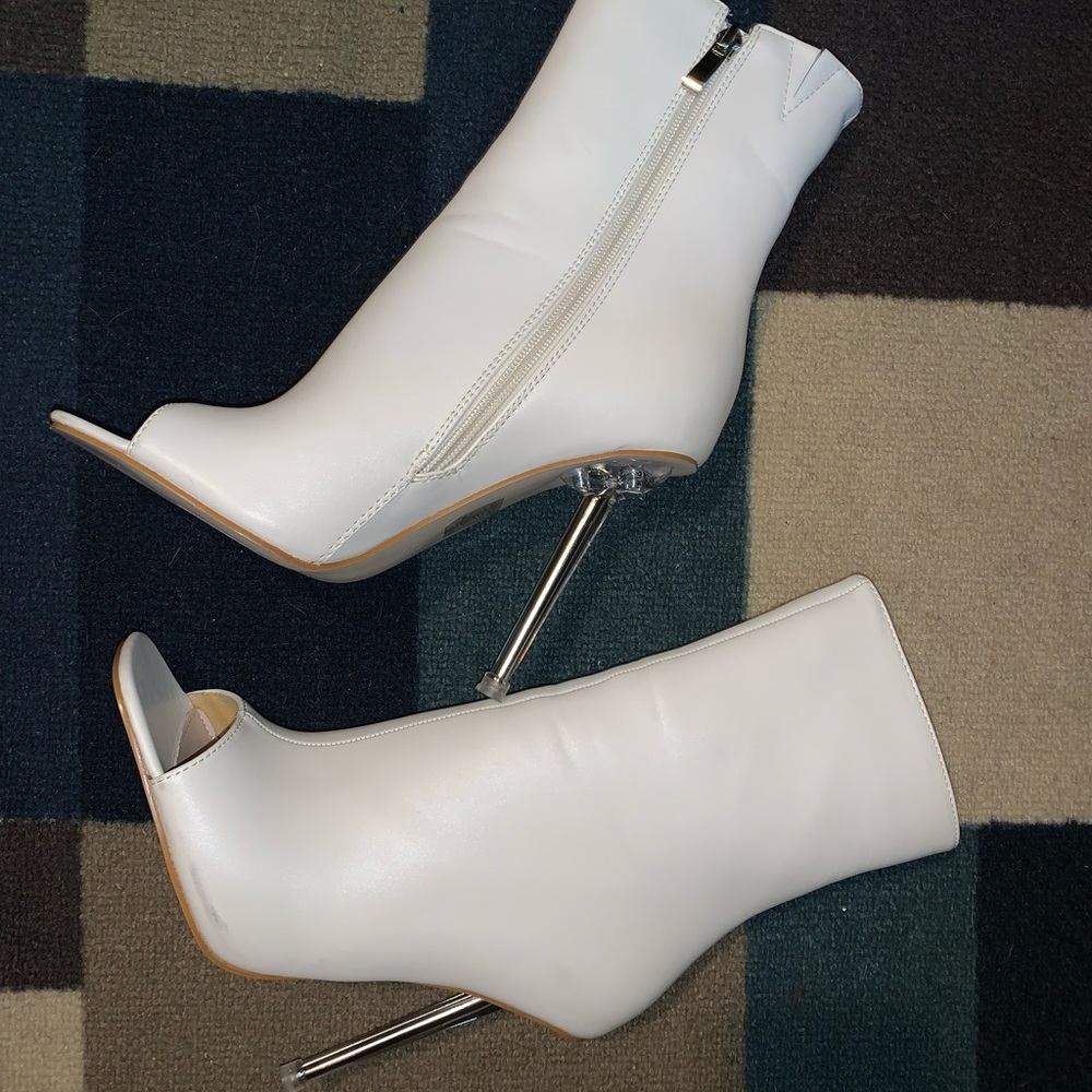 White, open toe, stiletto heel—unworn